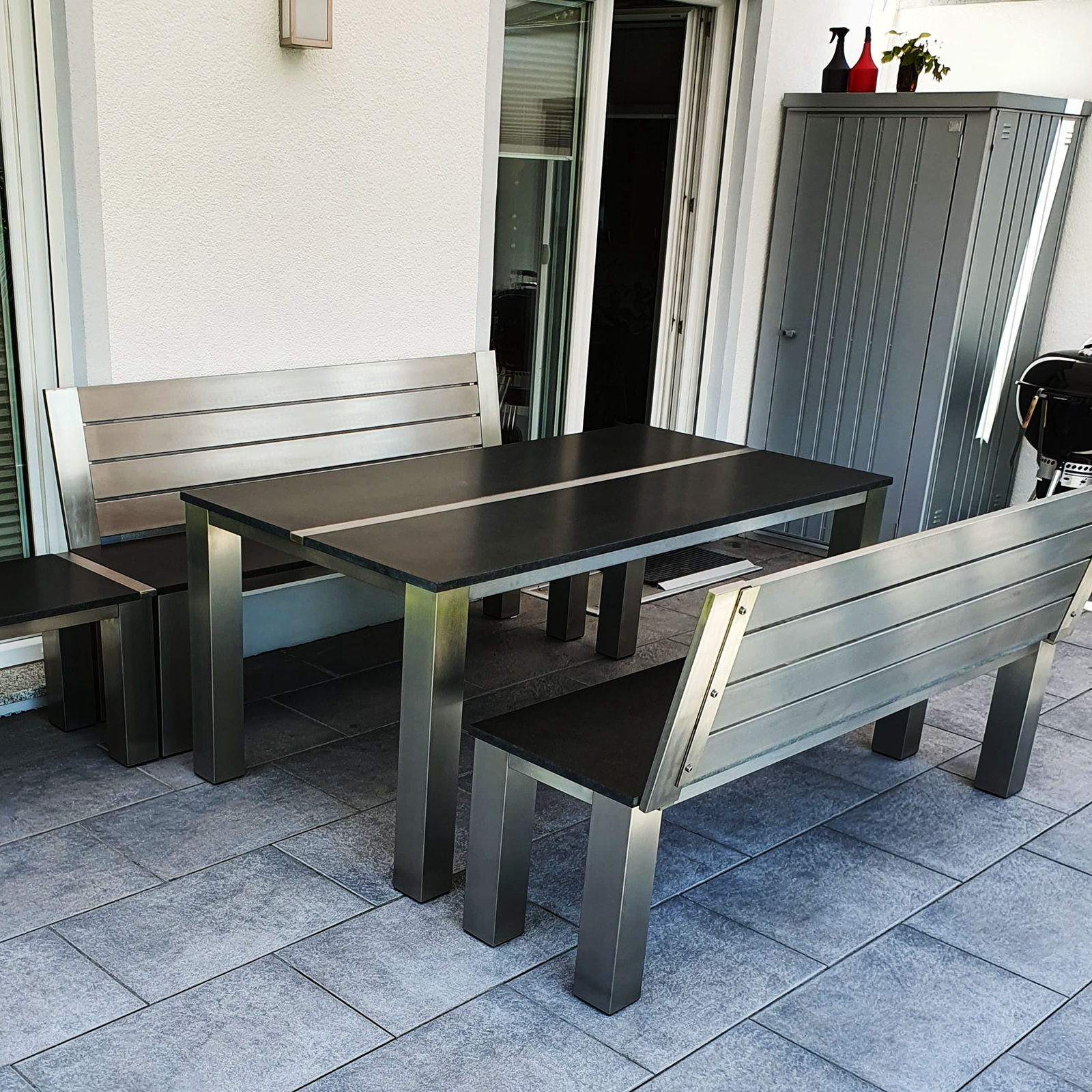 Natursteintisch mit Edelstahlgestell – Tischmanufaktur Axel Jahn