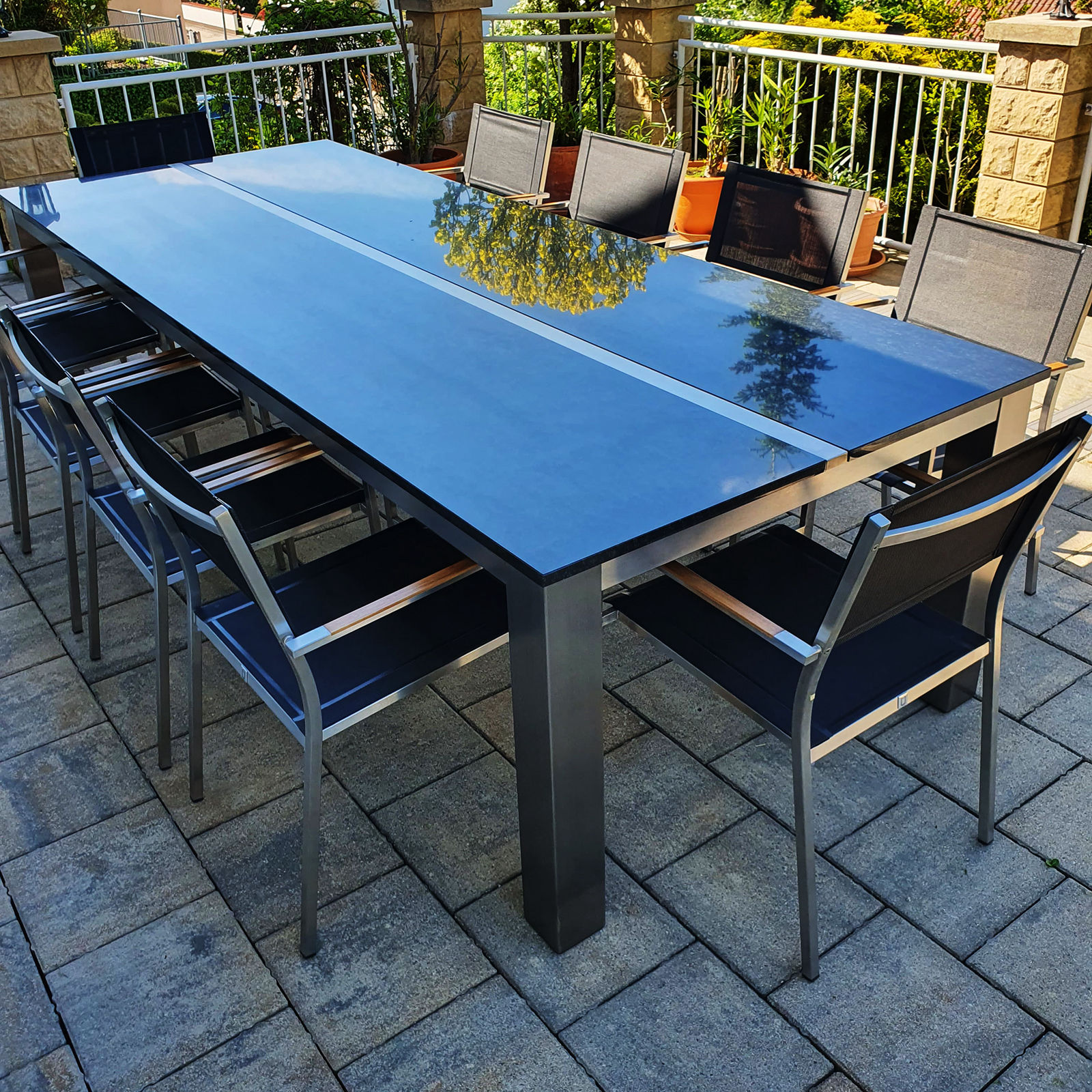 Natursteintisch mit Edelstahlgestell – Tischmanufaktur Axel Jahn